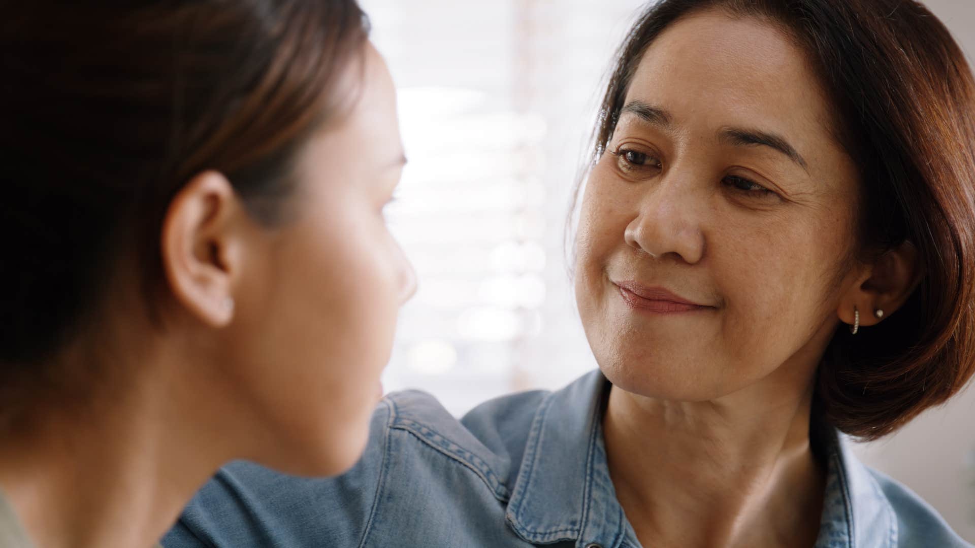 Older person listens carefully showing communication secret