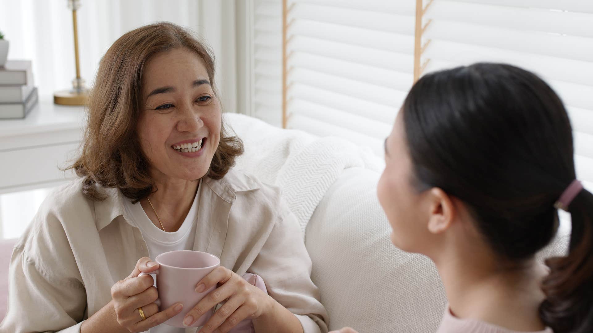 intellectually gifted woman interested in conversation with daughter