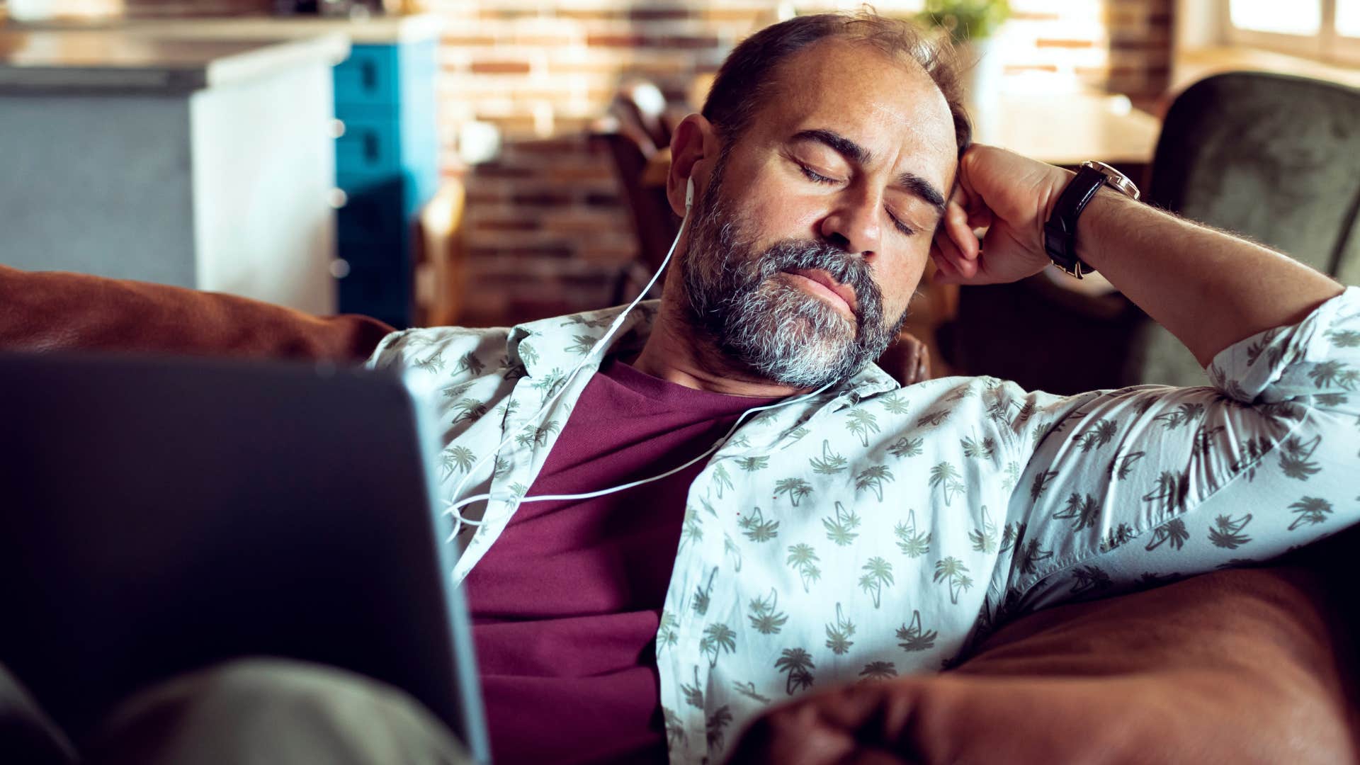 man who appreciates alone time sitting at home peacefully resting