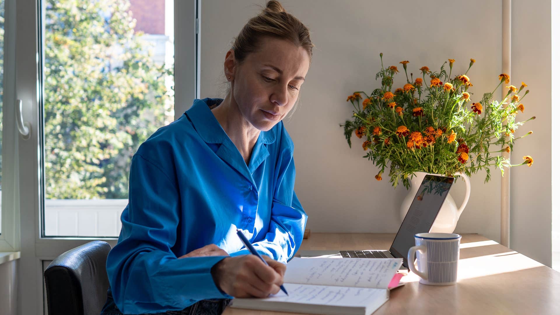 highly efficient woman planning on a calendar