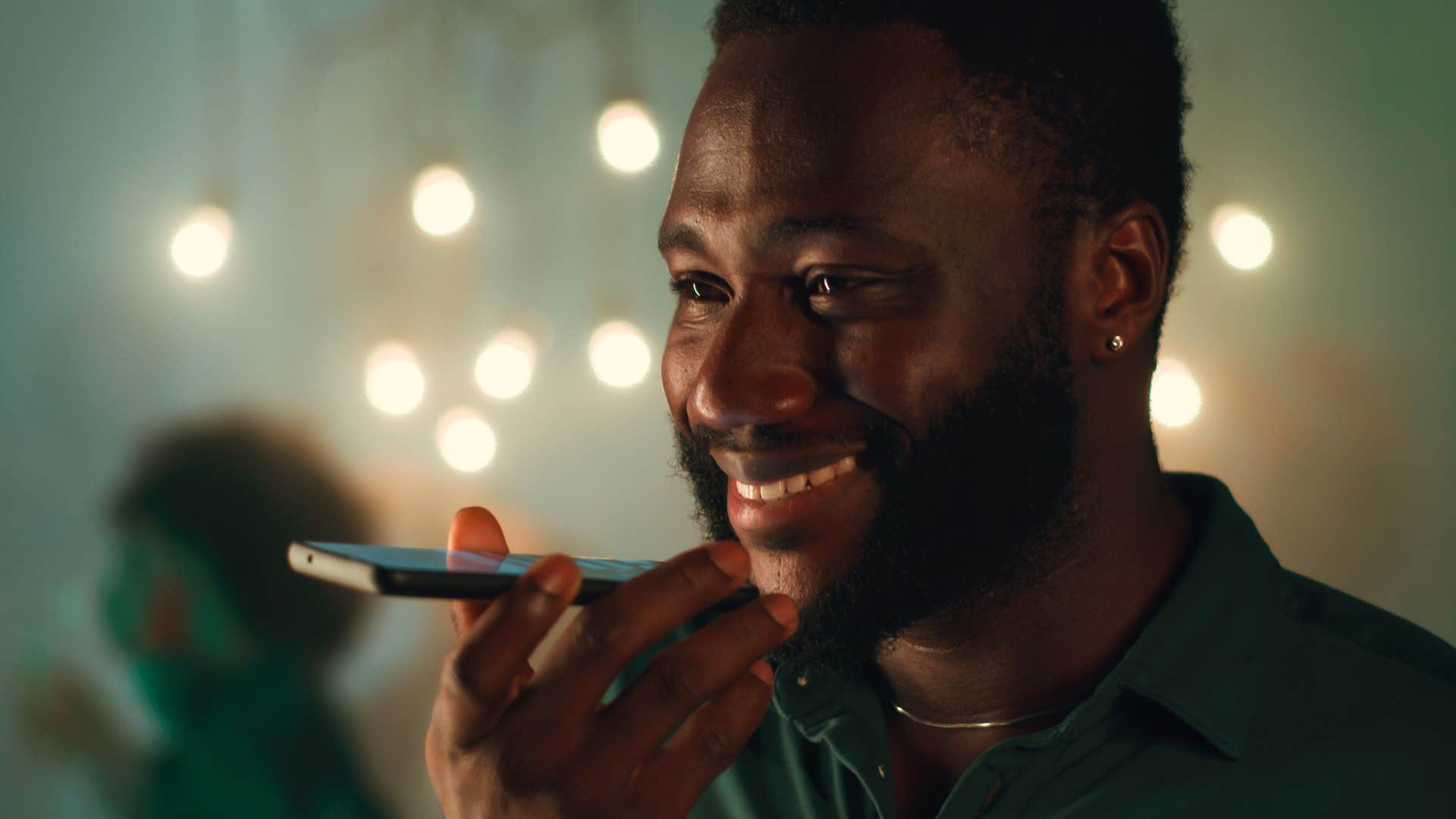 man who's not performative talking on the phone after leaving a party