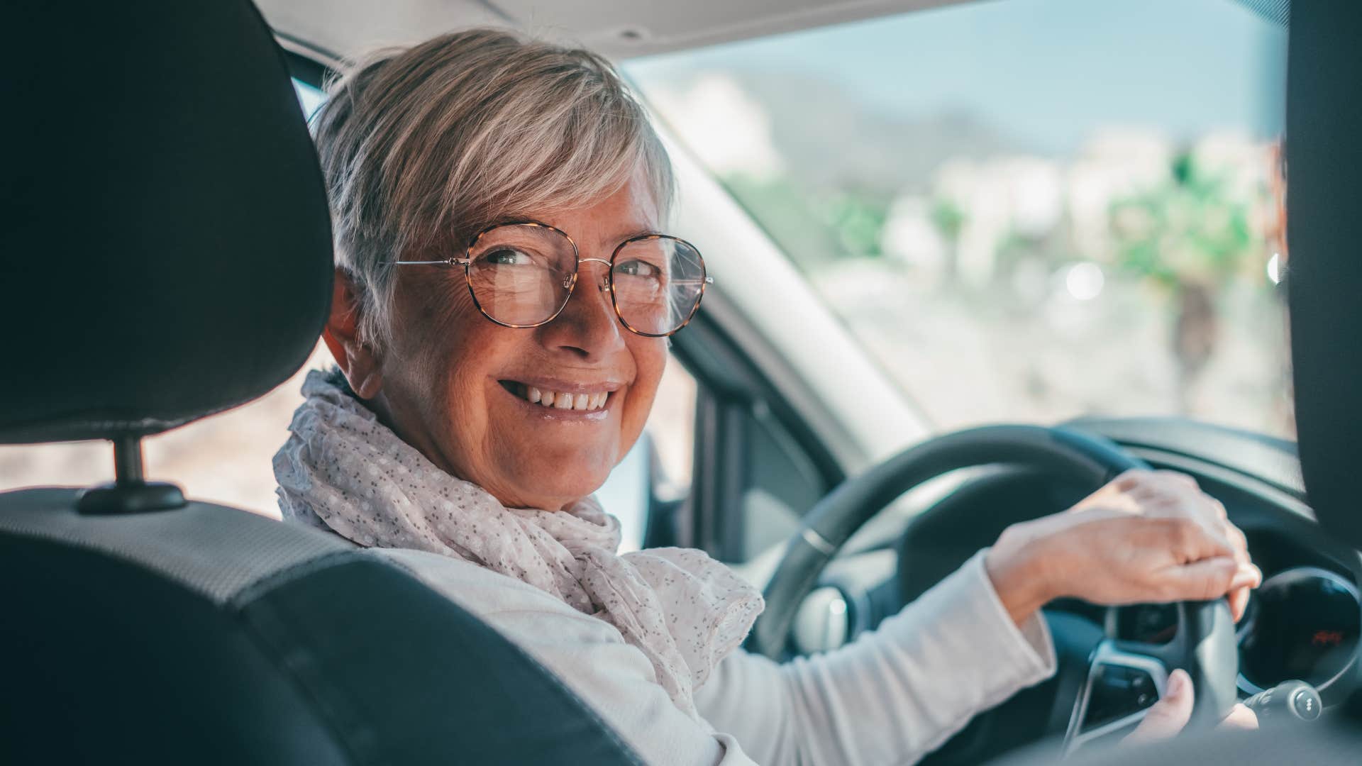 empathetic woman driving a car