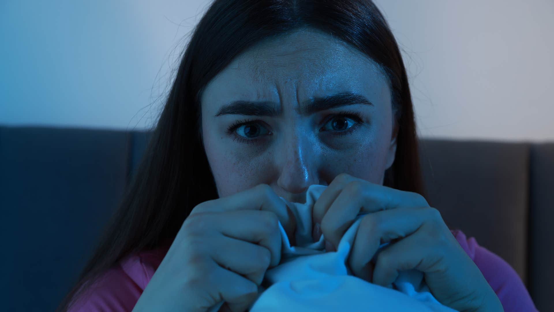 woman feeling afraid having a dysregulated nervous system