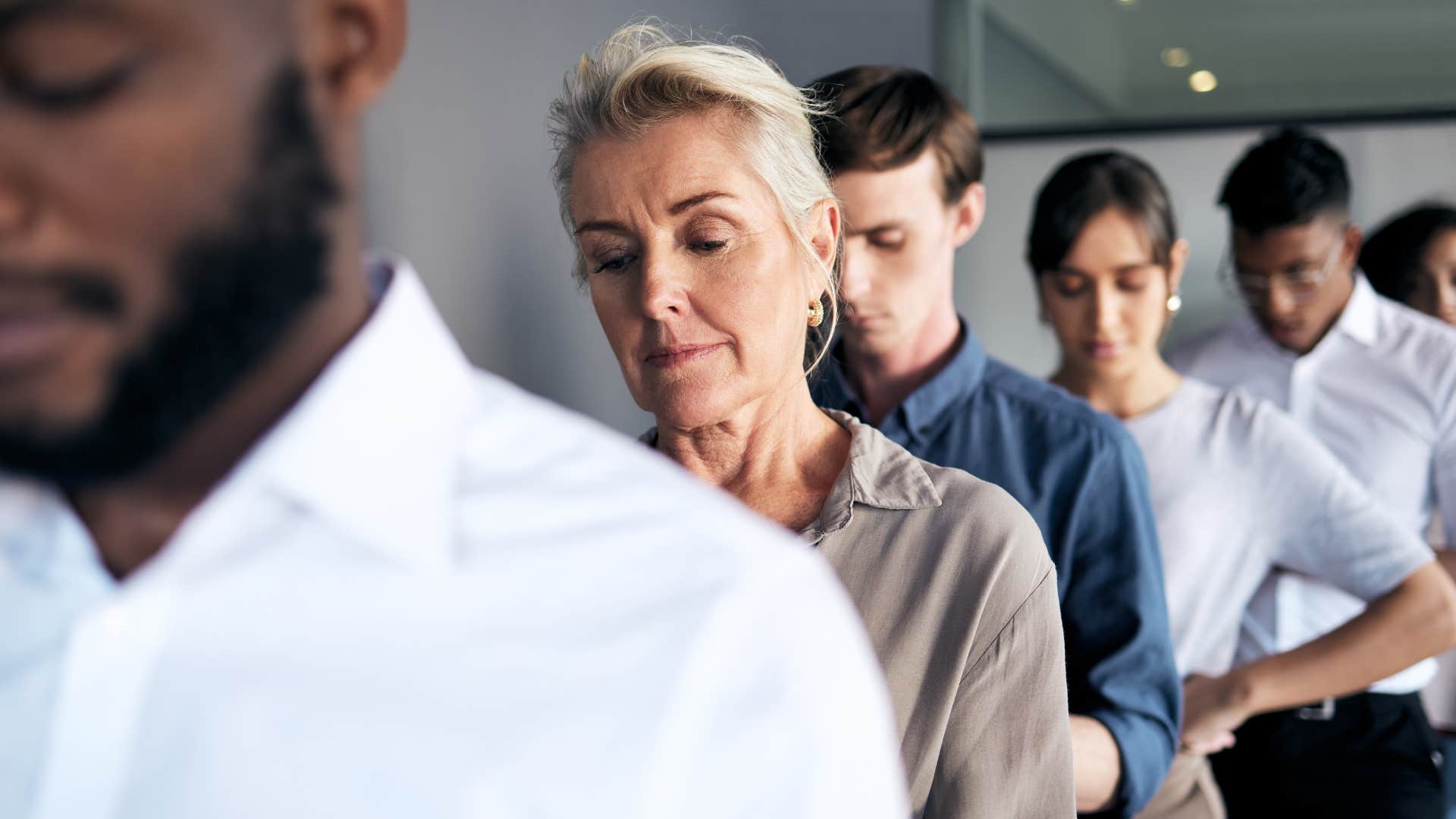Job candidates in line anticipate interview