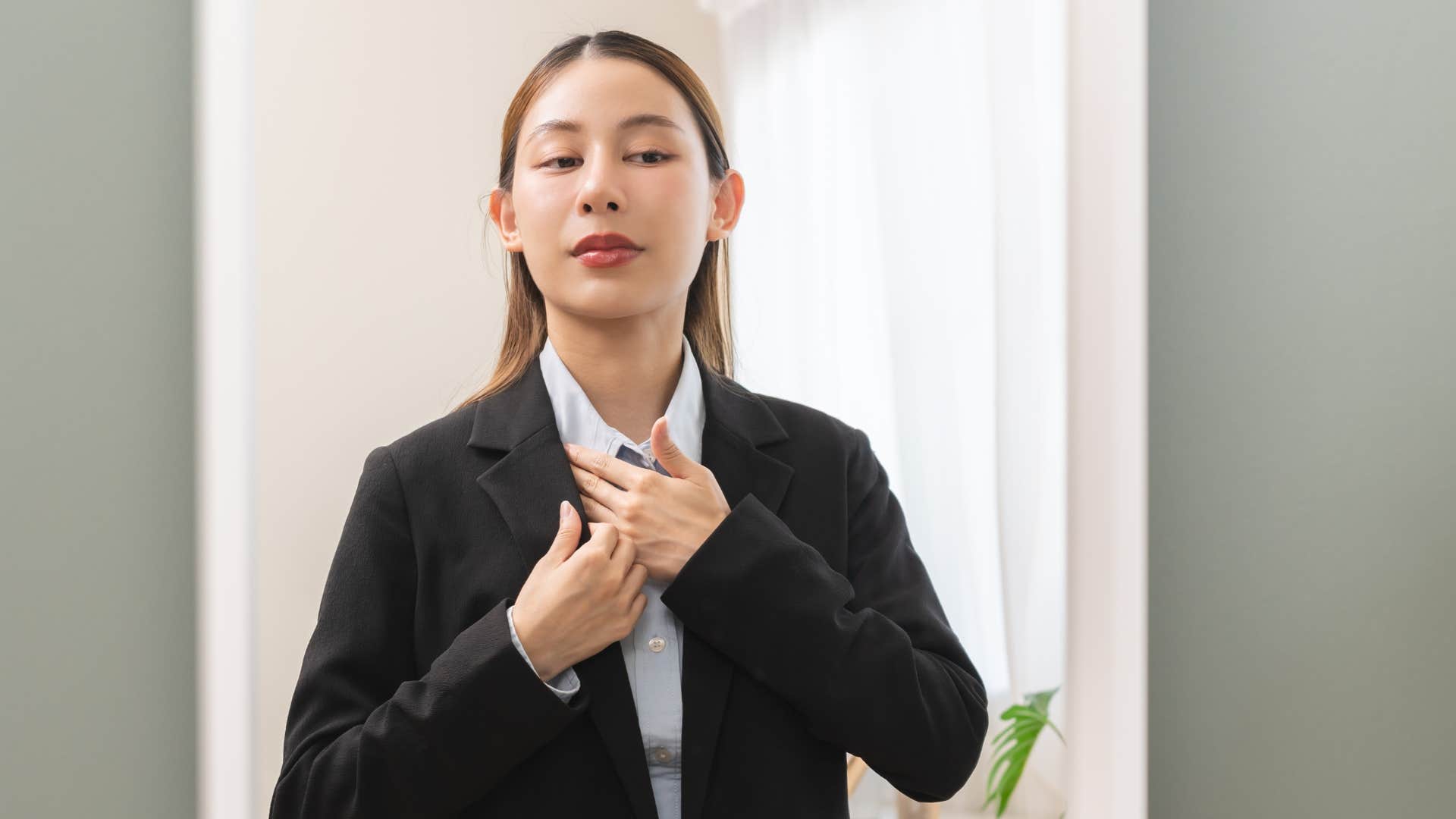 Smart person adjusts clothes to dress for successful interview