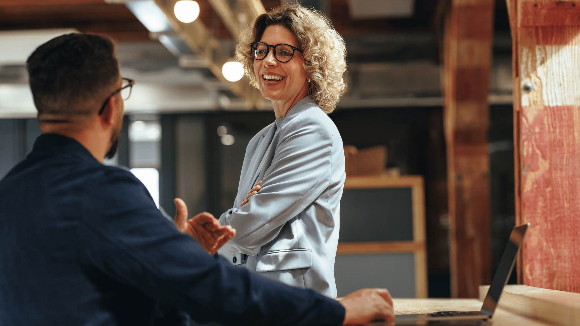 woman who notices when someone is left out as she notices the emotional energy in a room