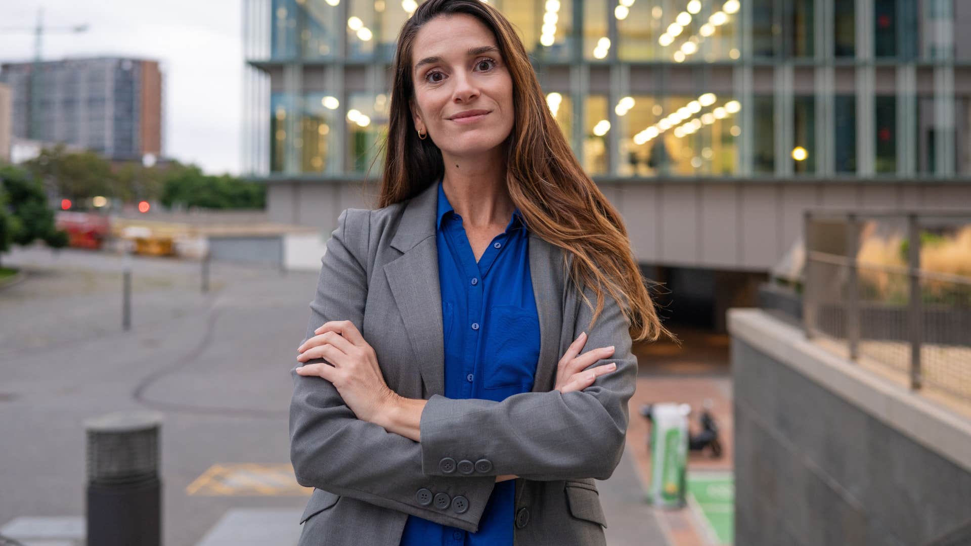 incredibly ambitious woman smiling at work