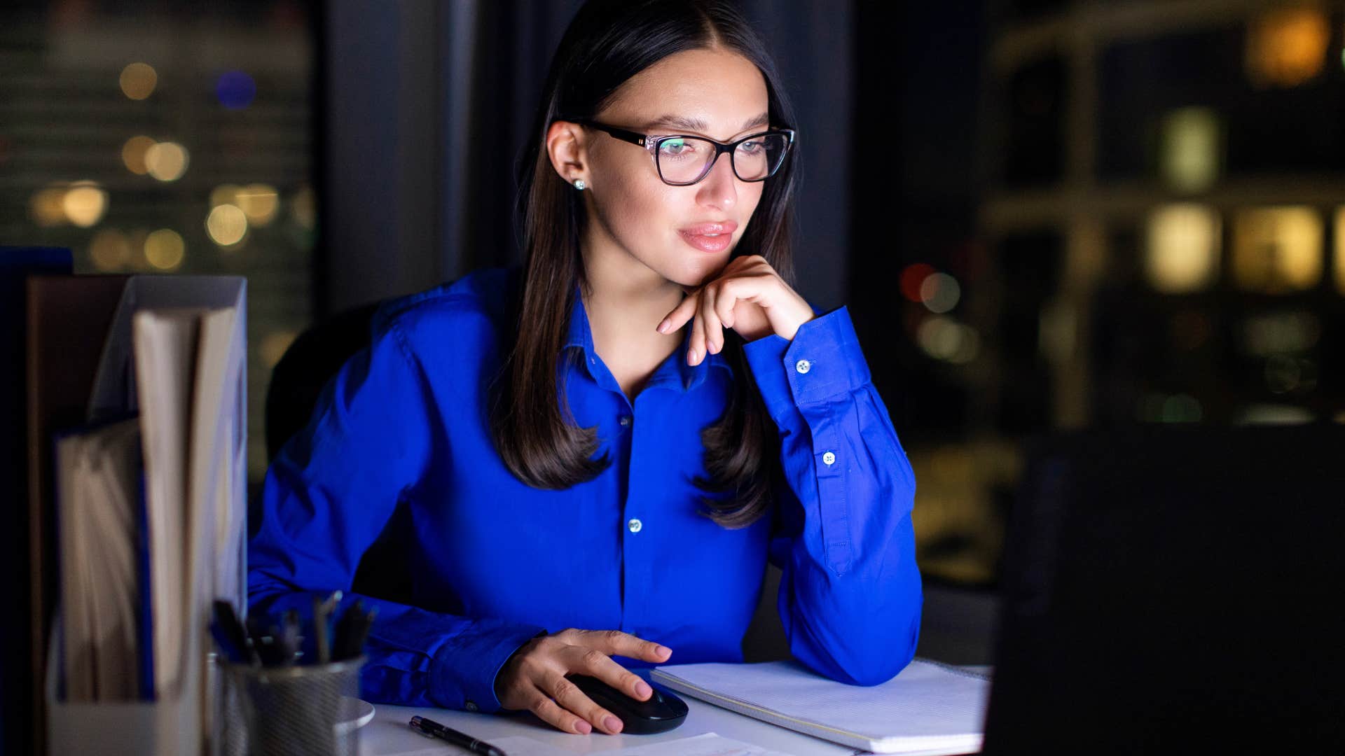 productive woman working late only getting a few hours of sleep