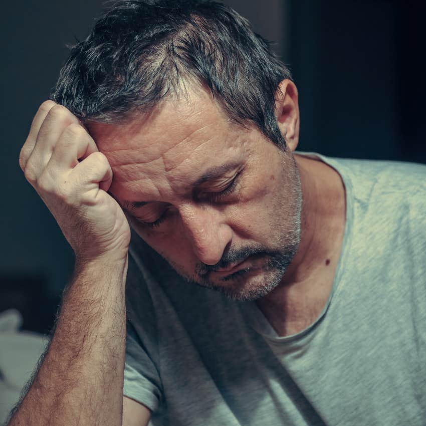 man who's burnt out and exhausted falling asleep