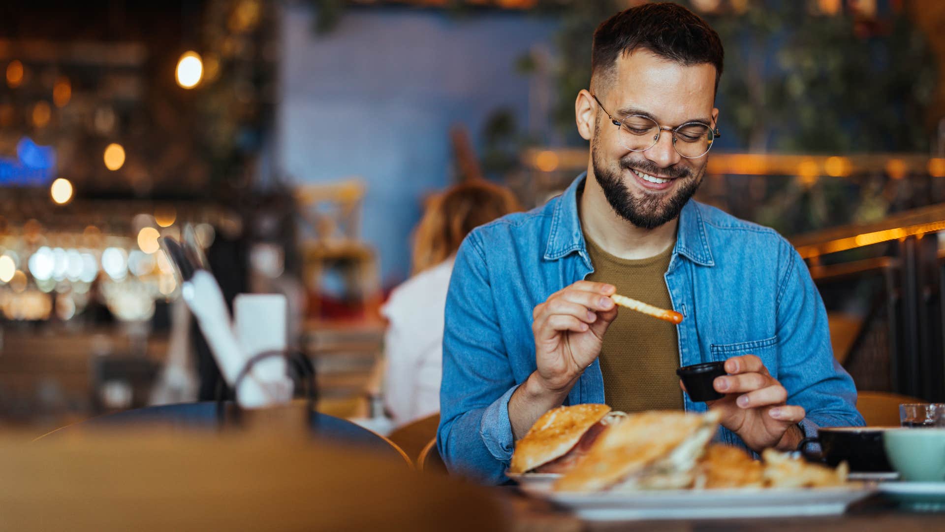 man who doesn't need credit and validation for everything eating at a restaurant