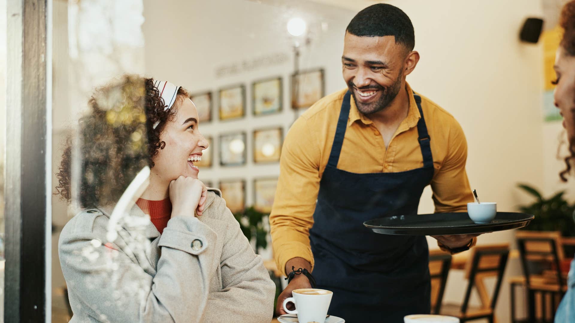 woman who values little things in life talking to a barista