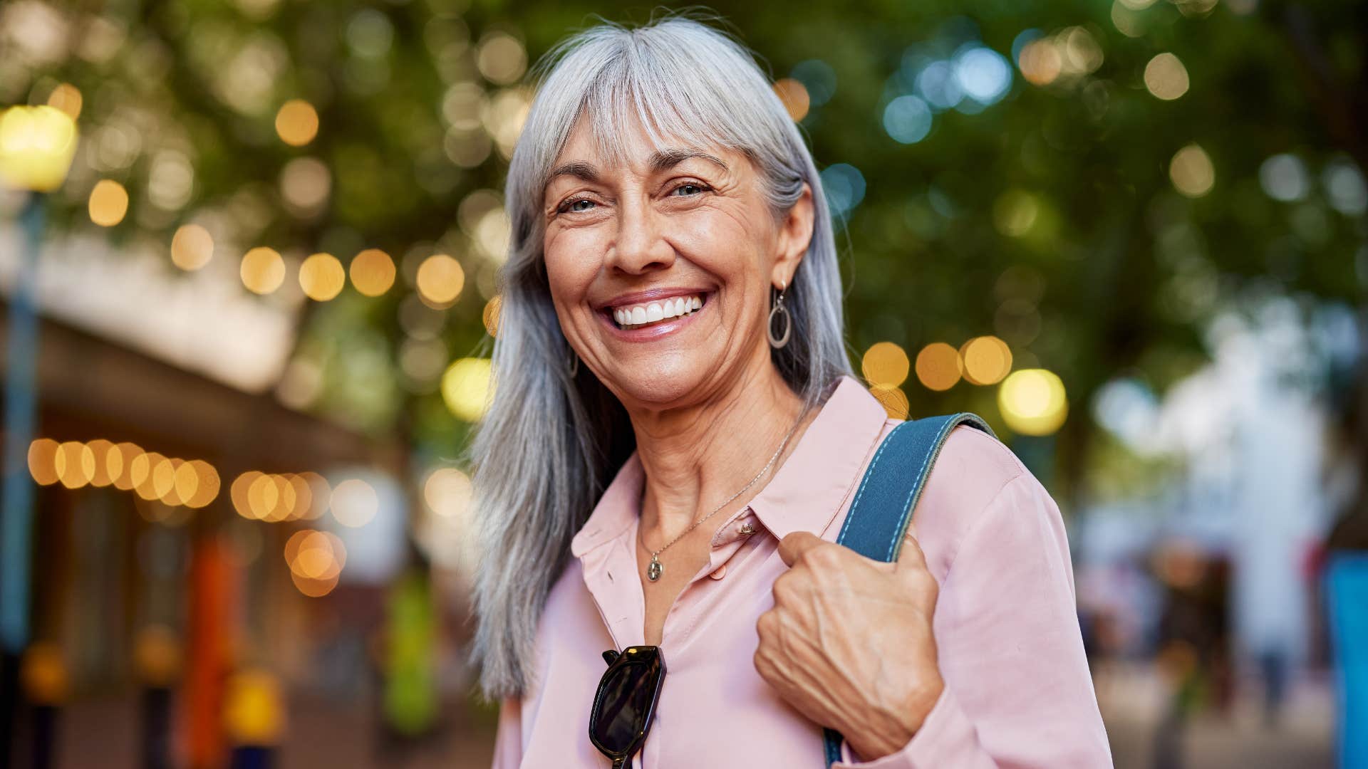 Older person affirms happiness daily with good social habits