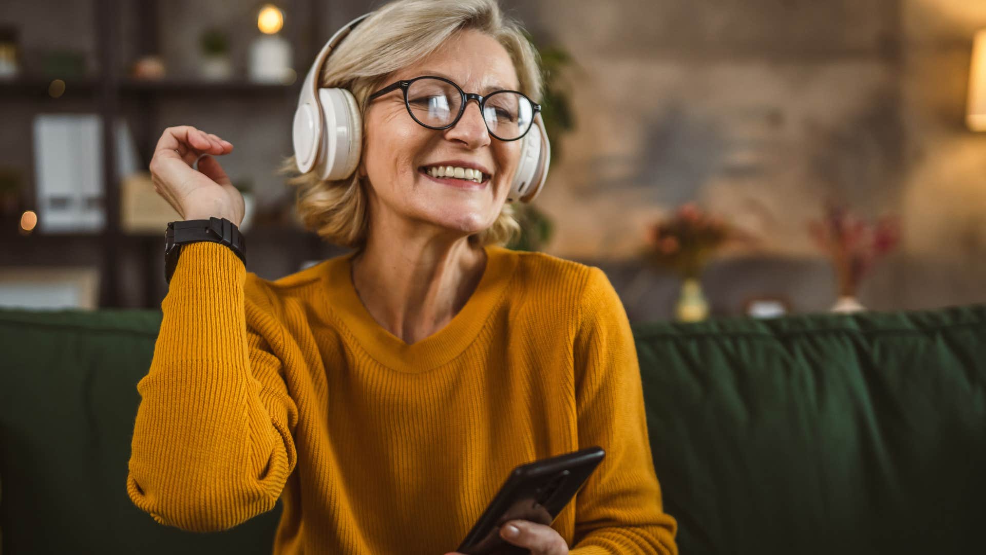 woman who doesn't perform for anyone listening to music on headphones