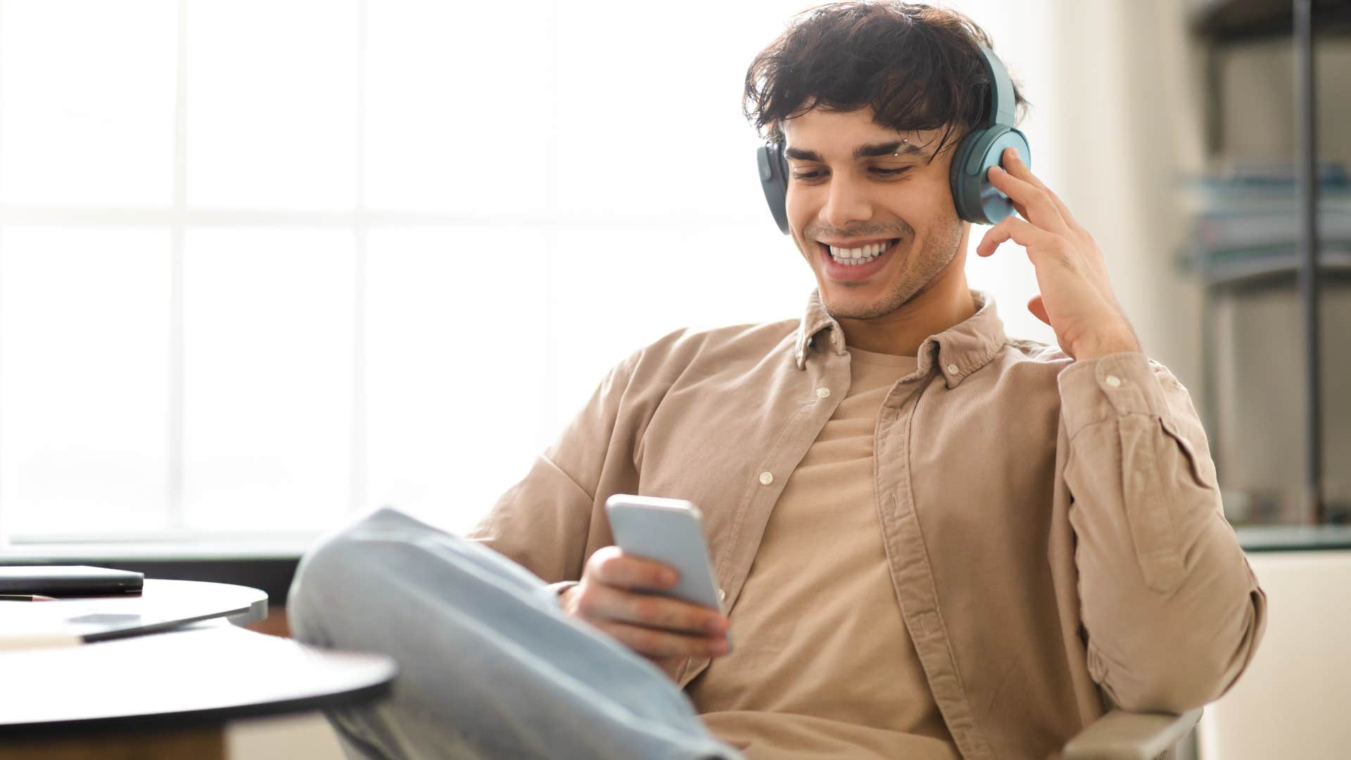 man who finds belonging in healthy ways listening to music
