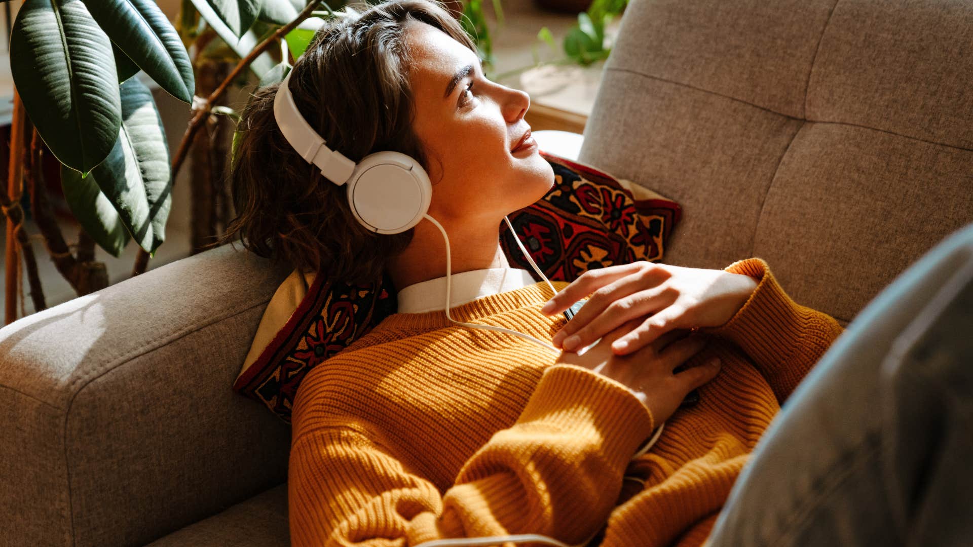 woman with a strong sense of identity listening to music