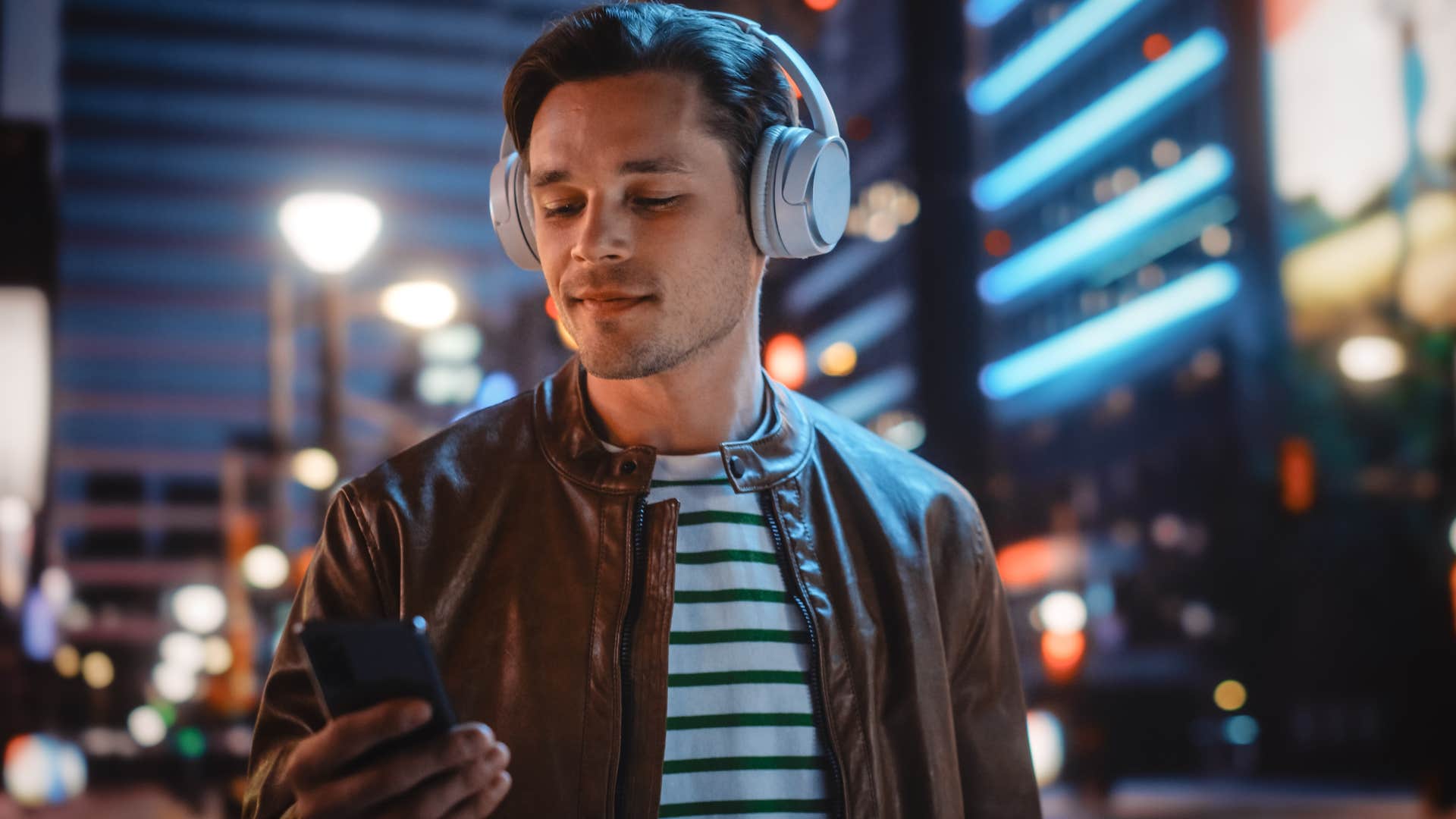 Man who appreciates artistry listening to 80s and 90s music