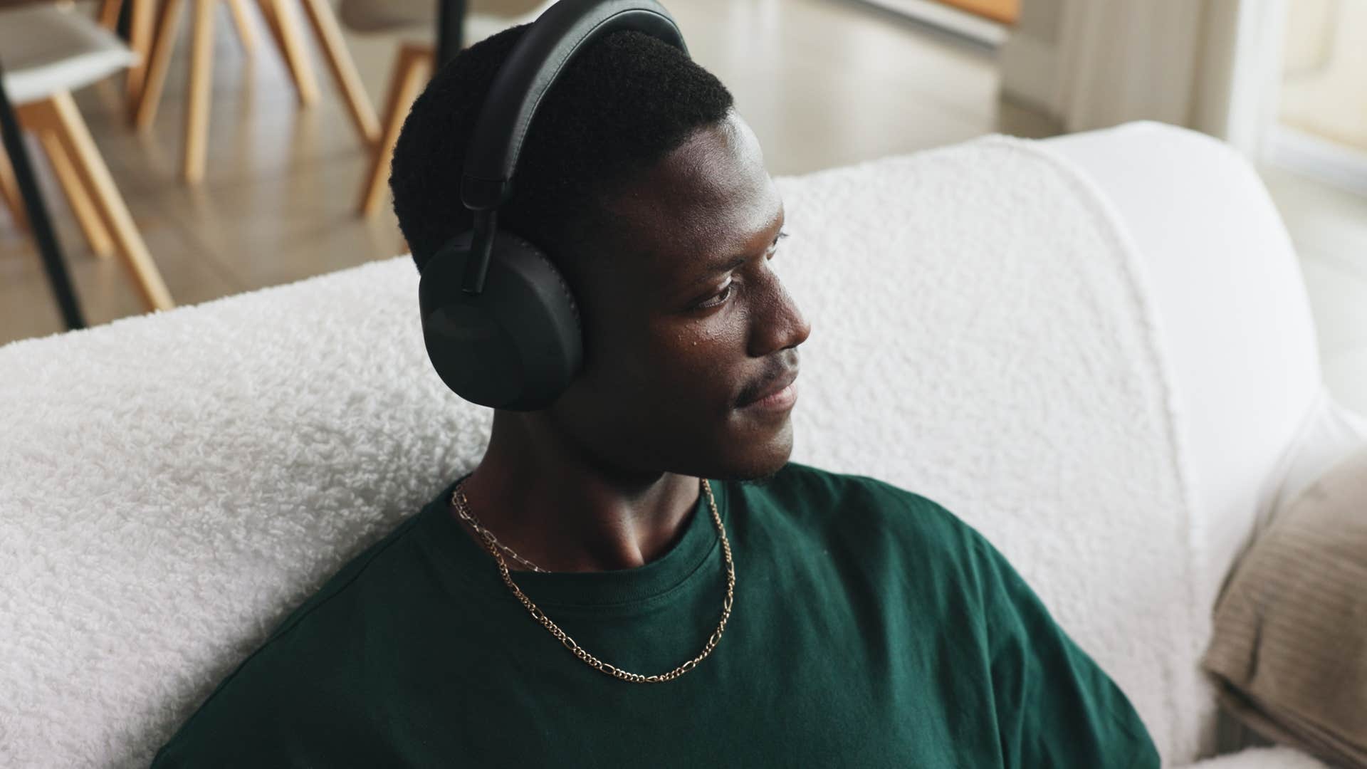 Deeply sensitive man listening to 80s and 90s music