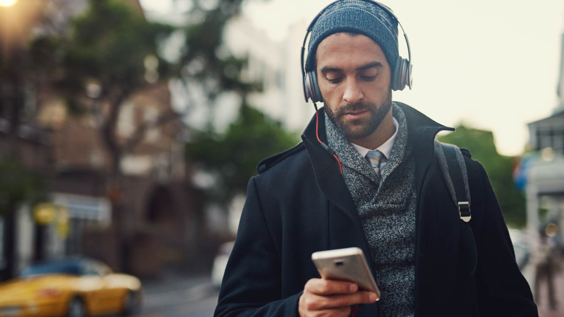 Introspective and introverted man listening to 80s and 90s music