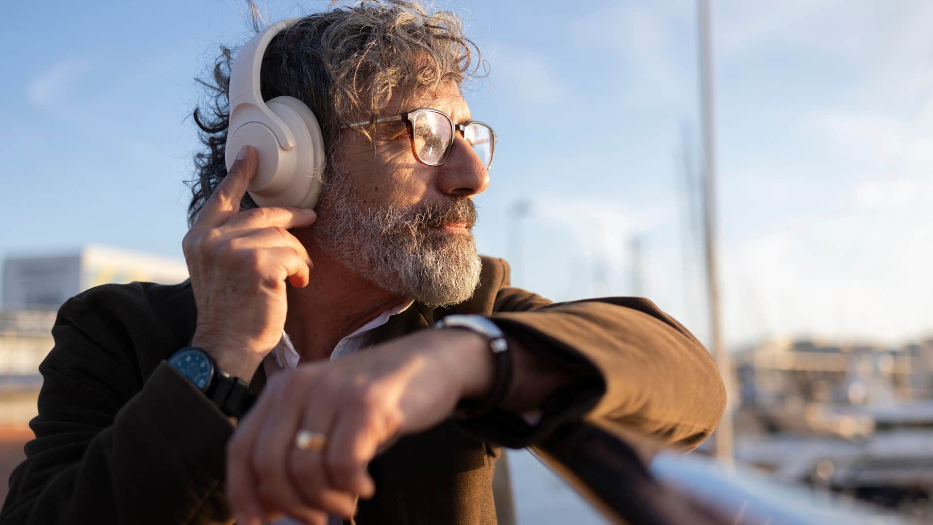 Man processing pent-up emotions listening to 80s and 90s music