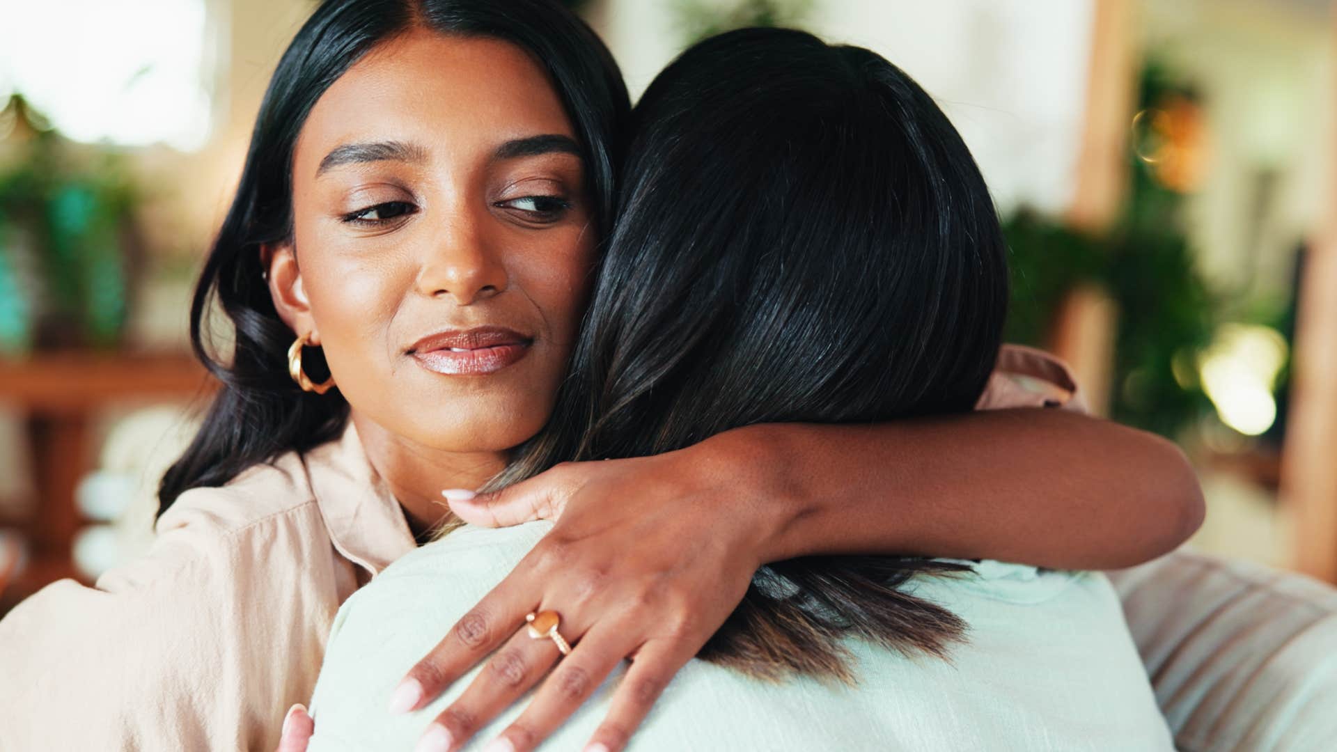 woman being the center of attention with a friend