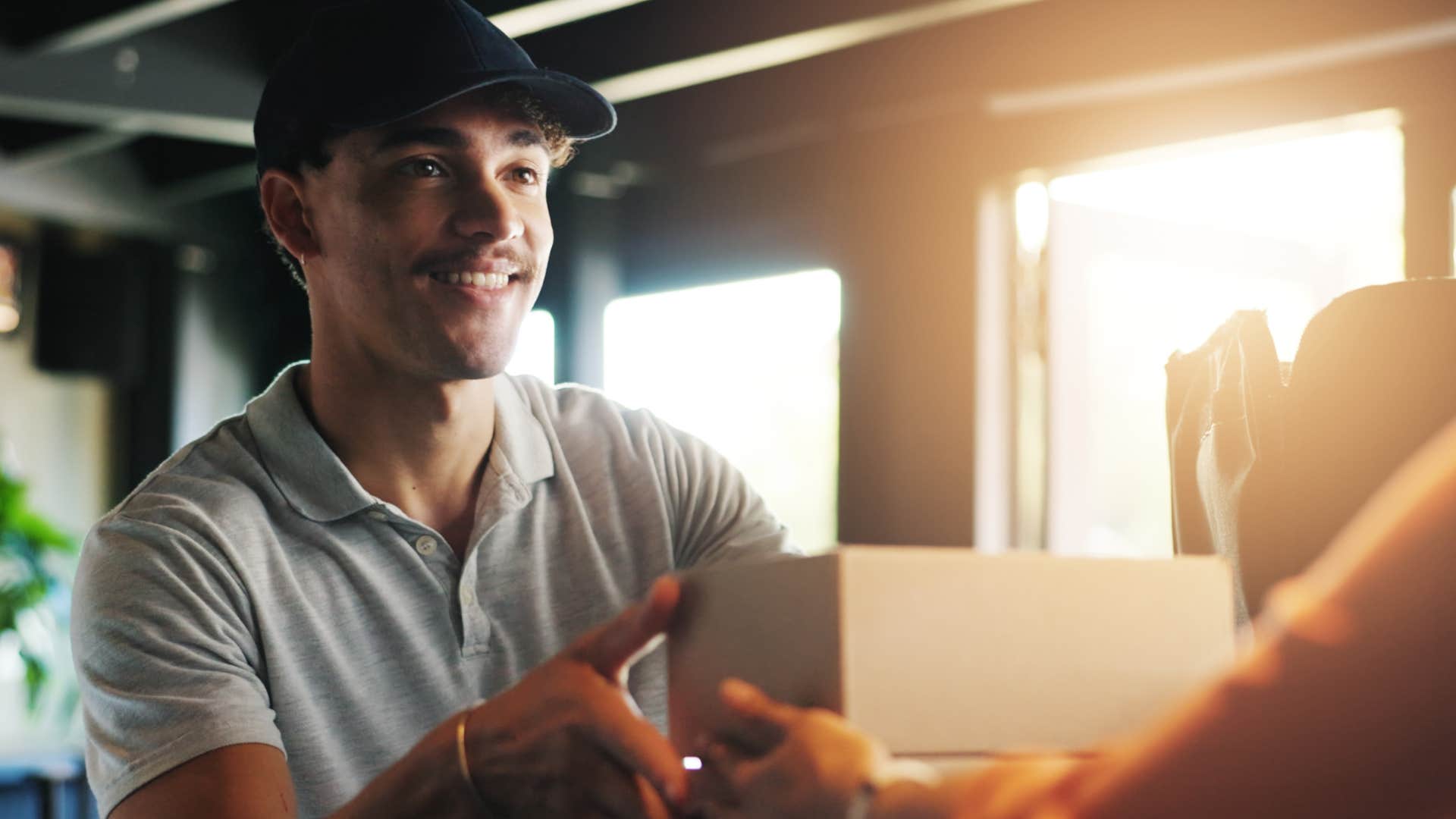 man who works in customer service who is very aware of his surroundings