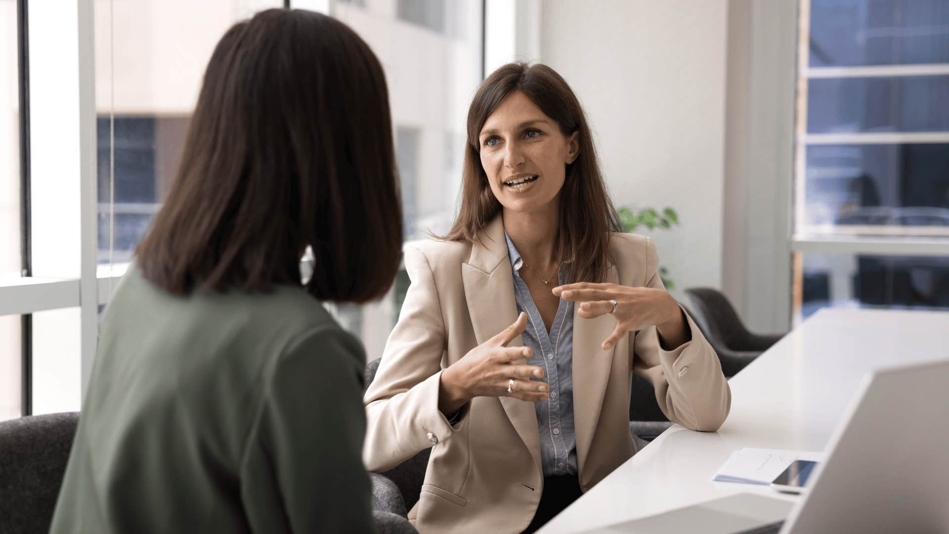 woman with high iq as as she says the phrase what's the long-term impact of that
