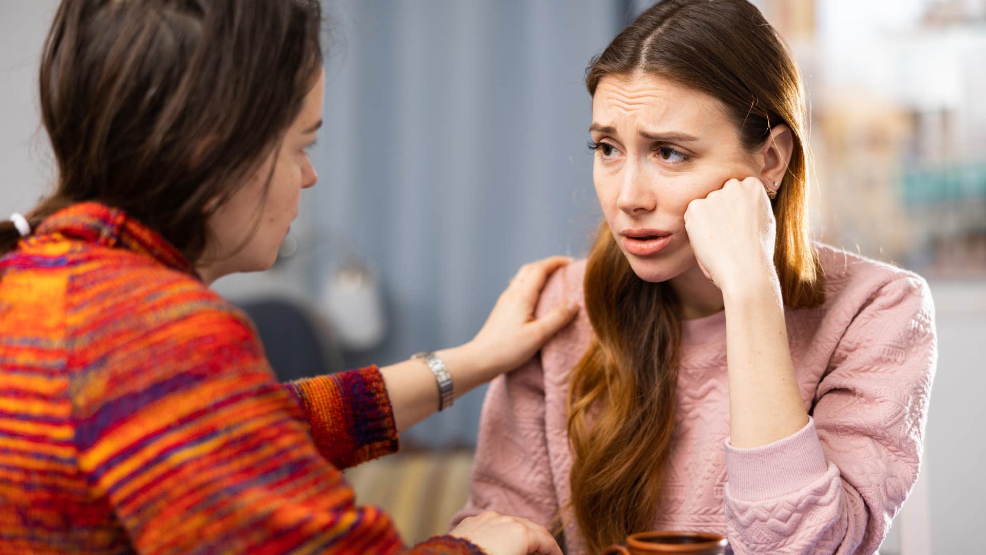Woman saying "I'm just bad at dating" at home.