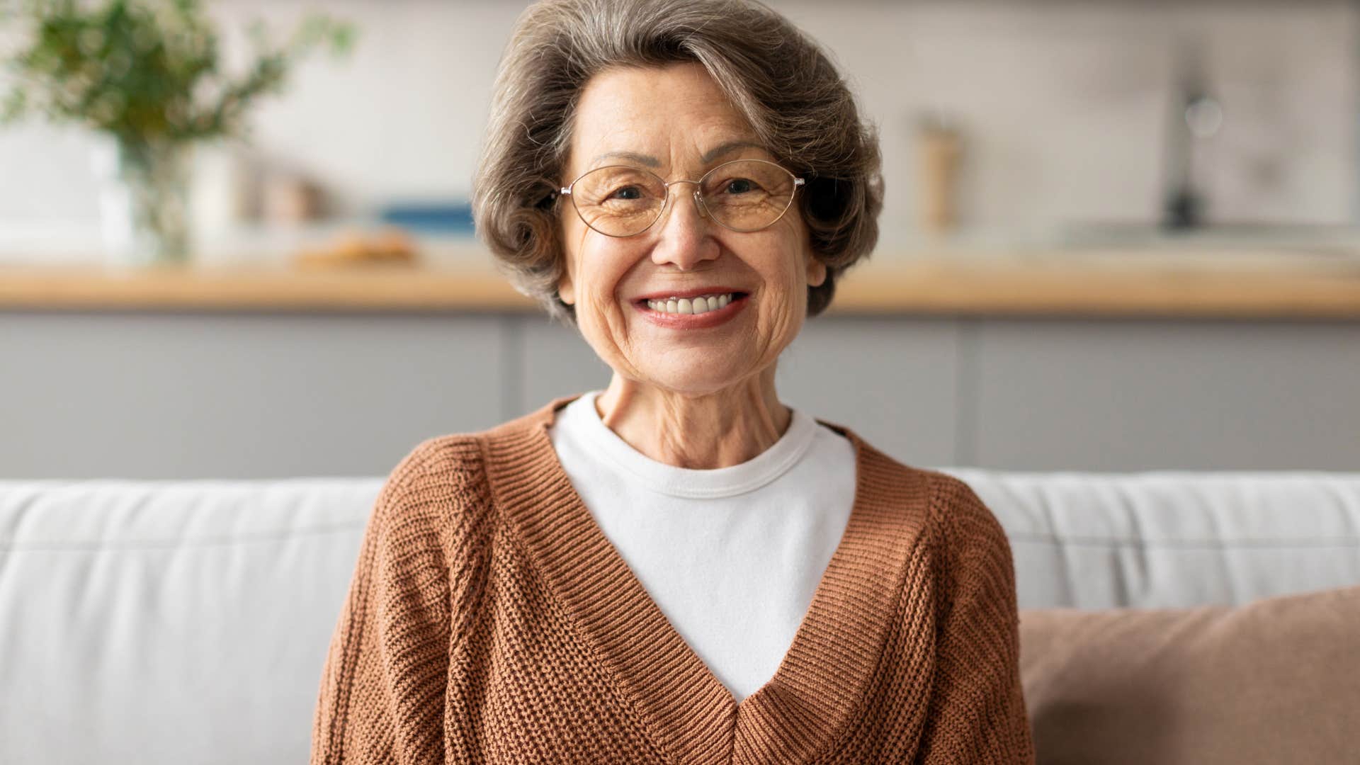 older southern woman smiling saying politely you dont follow the crowd
