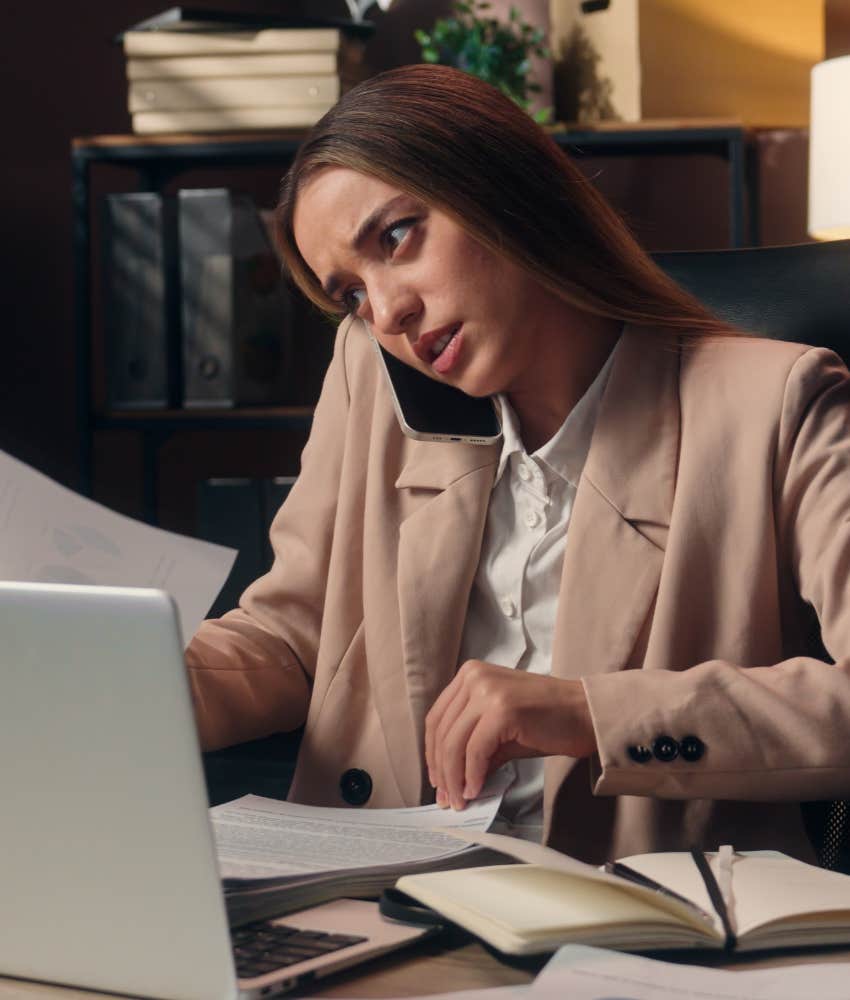Stressed person multitasks at job showing nowhere to go