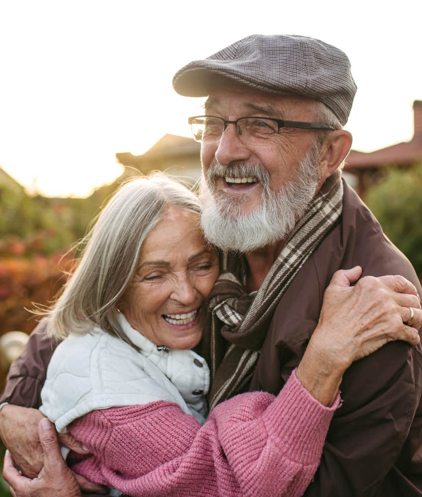 Happy married couple embrace showing acceptance