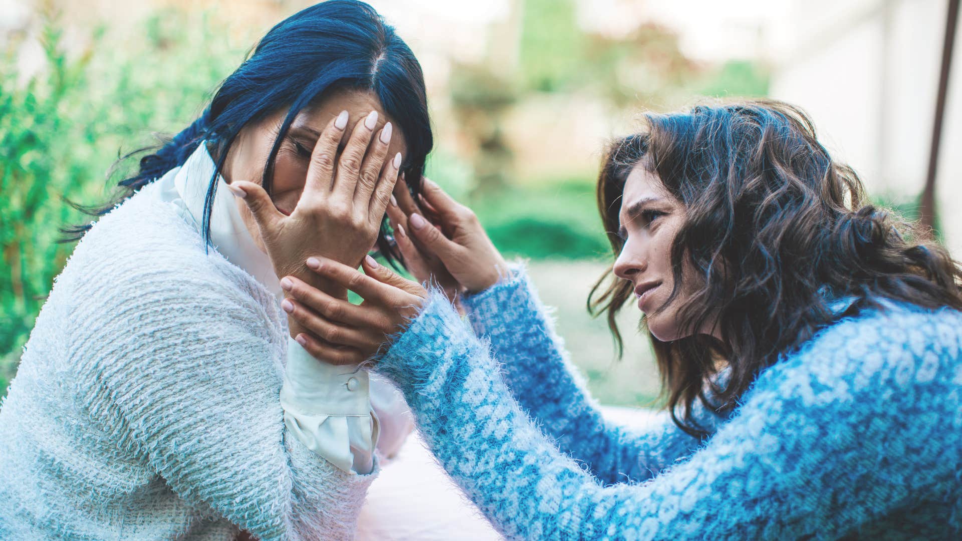 kind-hearted woman with exceptionally powerful inner strength comforting friend