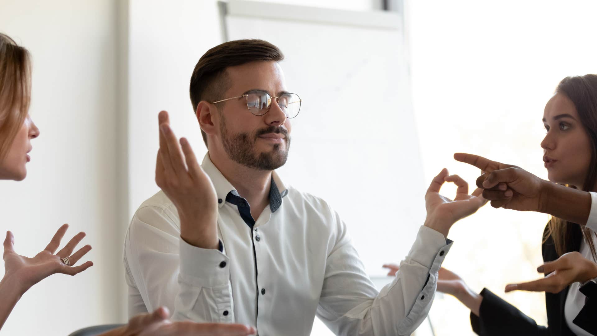 man with exceptional inner strength staying calm amidst fight at work