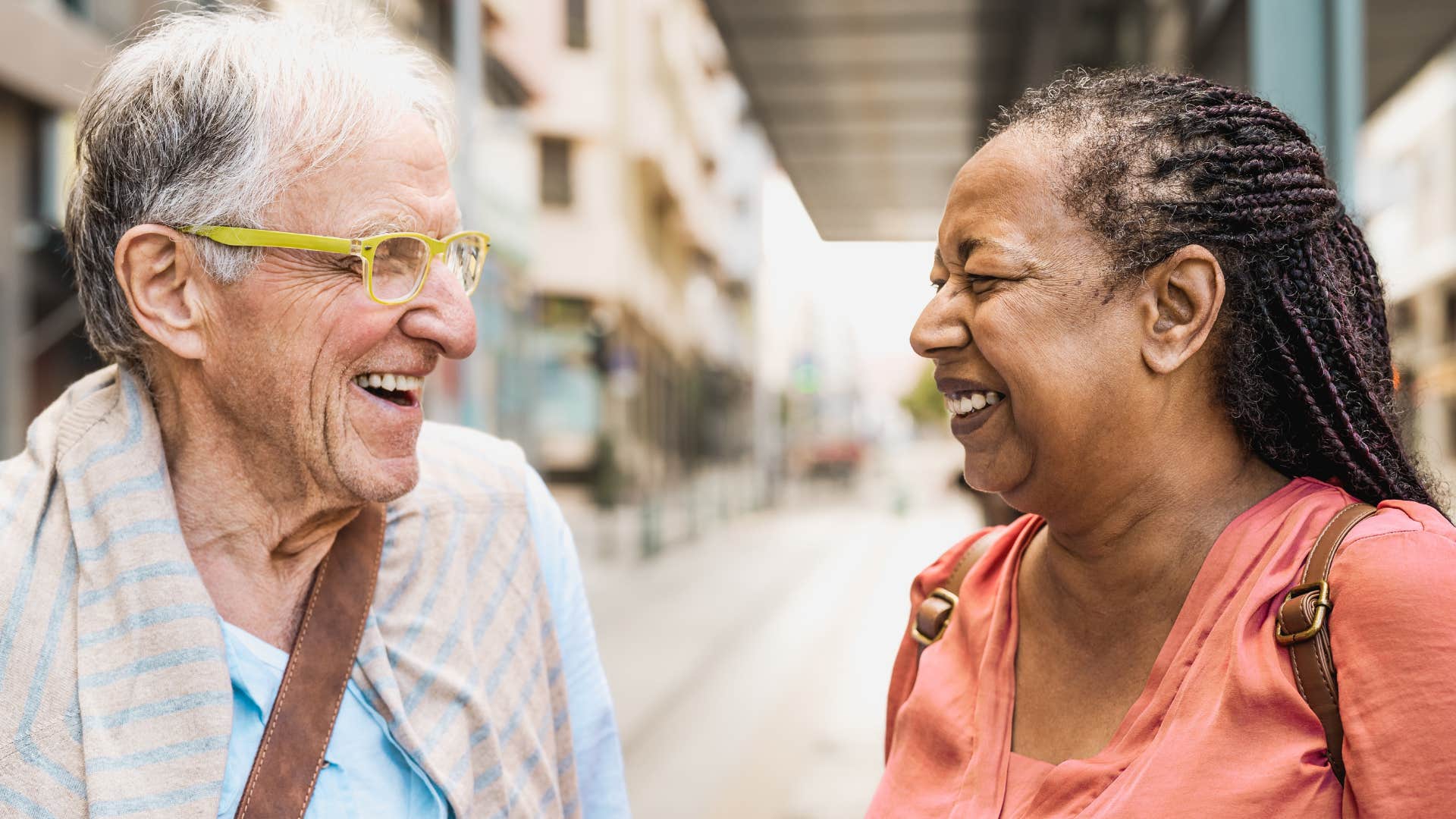 Aging couple laugh showing they don't judge each other