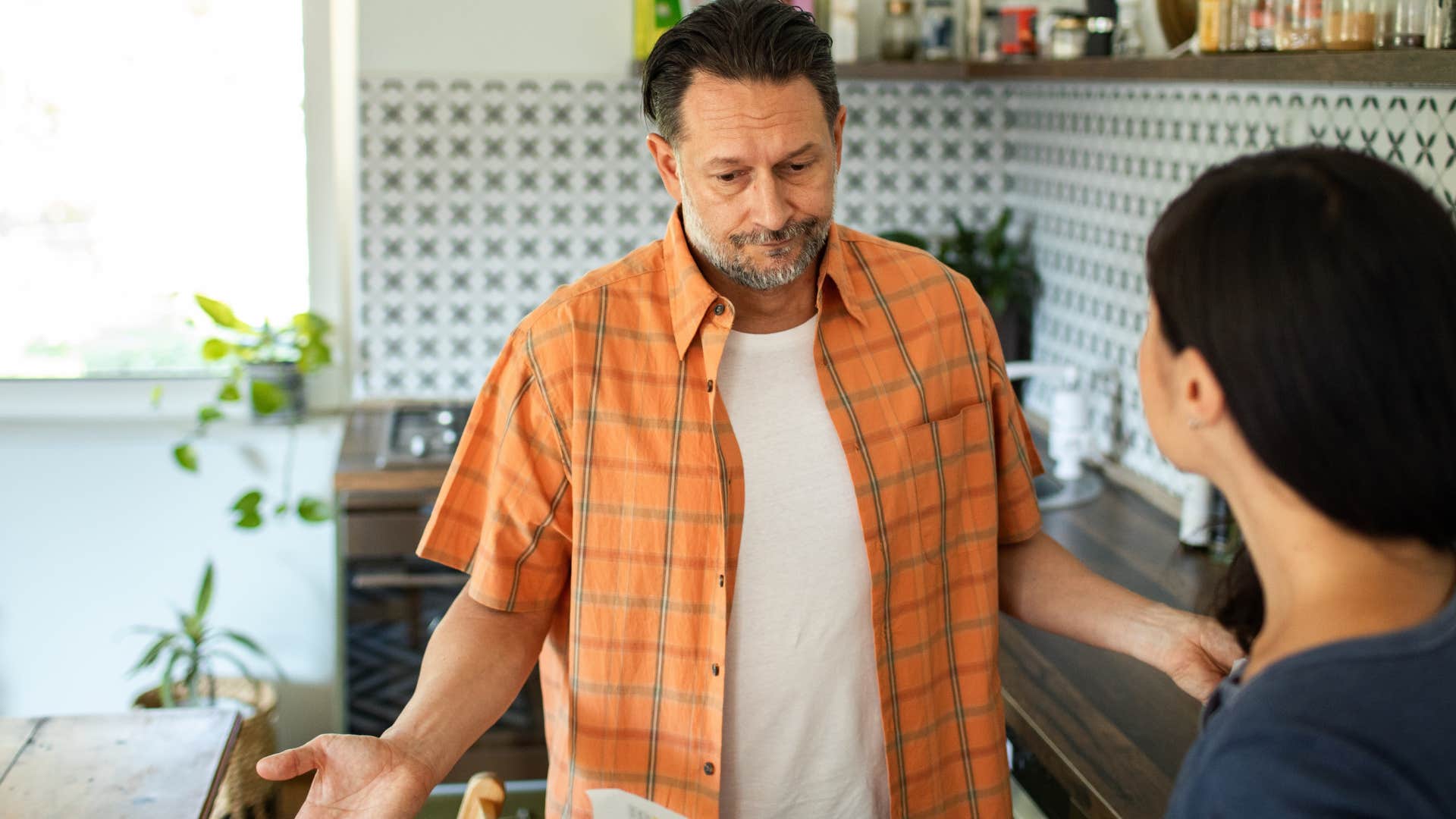 passive aggressive man shrugging telling partner good for you