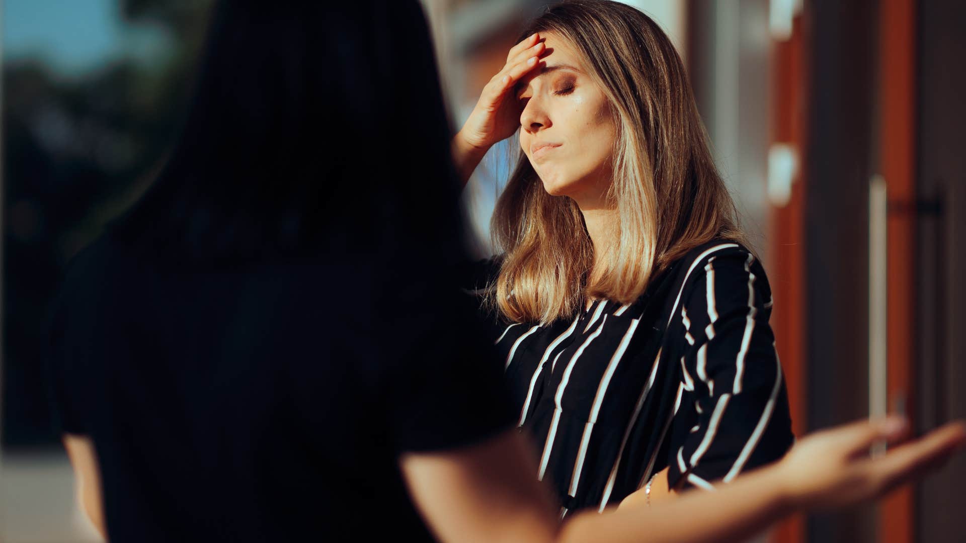 woman saying it's fine to an annoying person