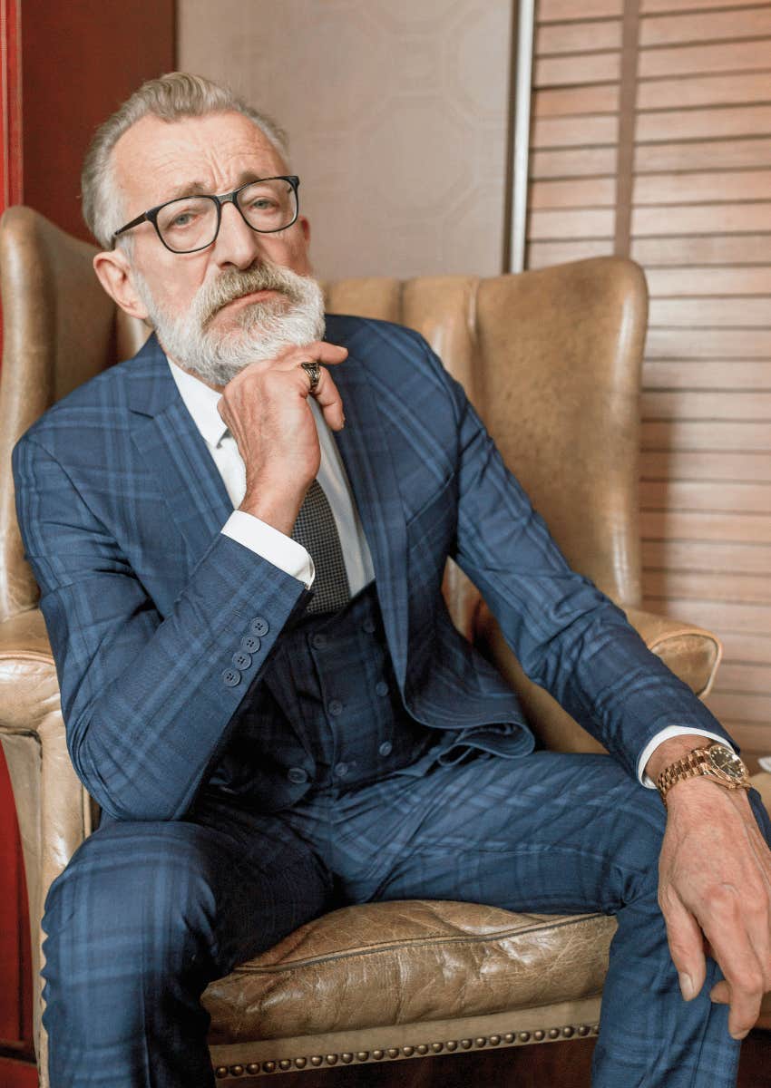 serious baby boomer parent wearing a suit