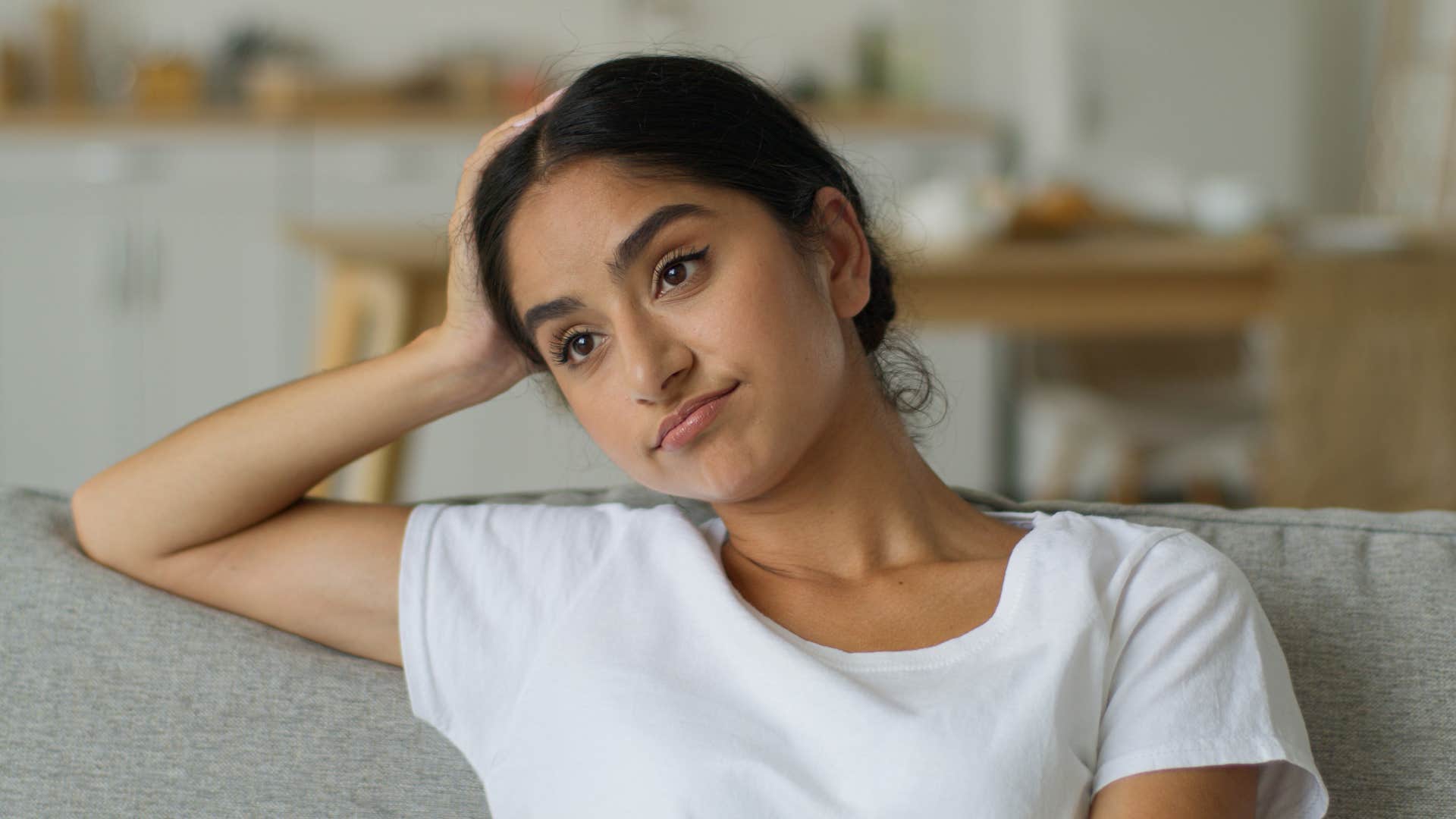 mentally exhausted woman feels bored in environments that are supposed to be fun