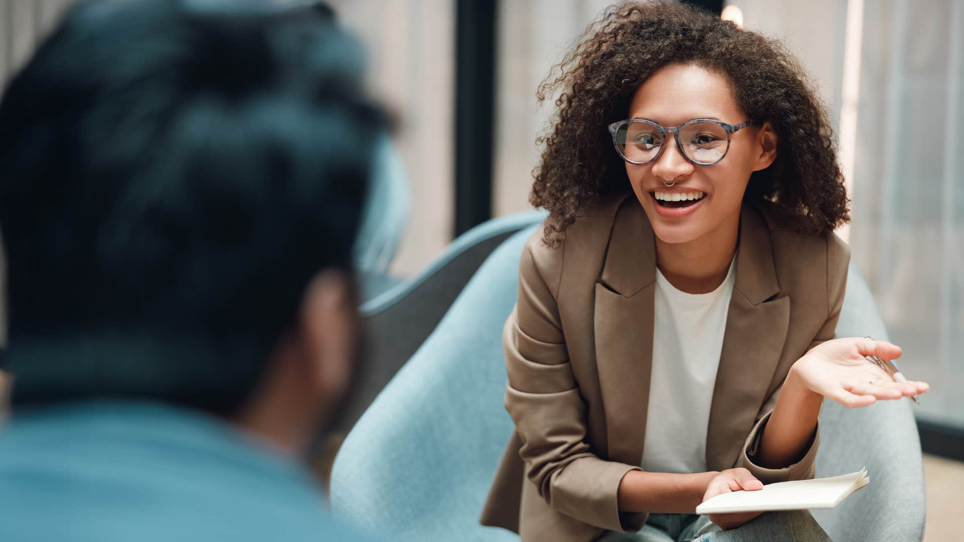 Woman who doesn't change her personality to suit others talking at work.