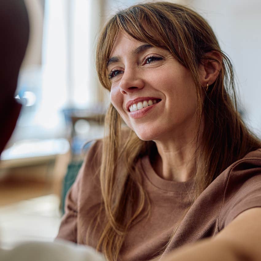 Woman who only smiles when it's genuine