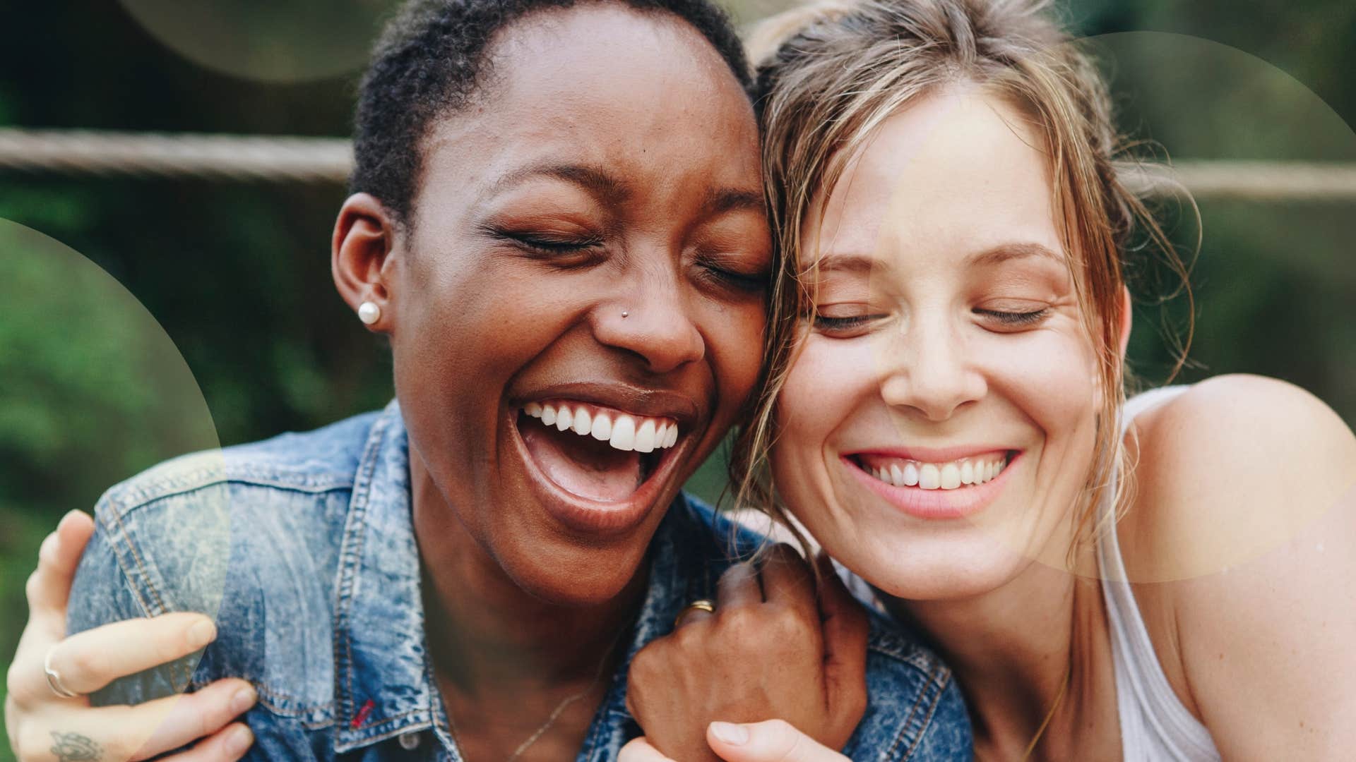 Woman with a few very close friends smiling outside.