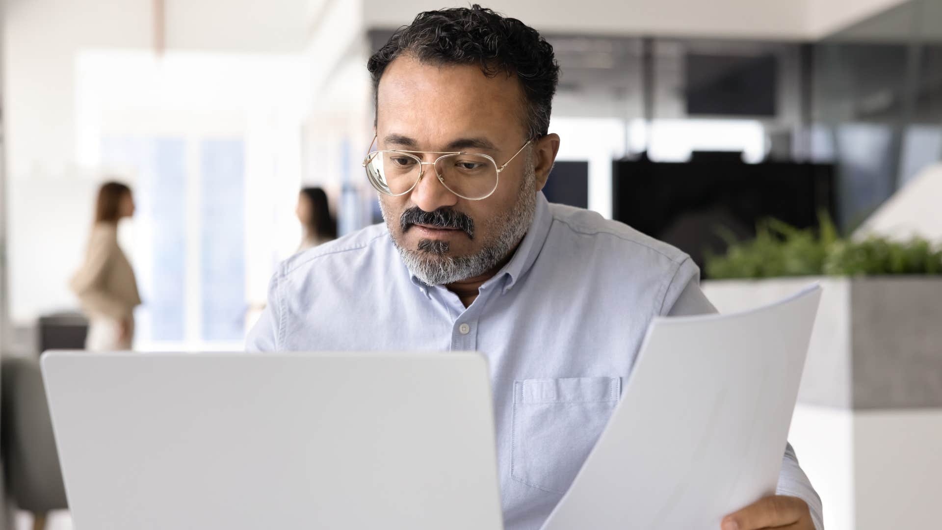 employee at work who rarely talks about his family
