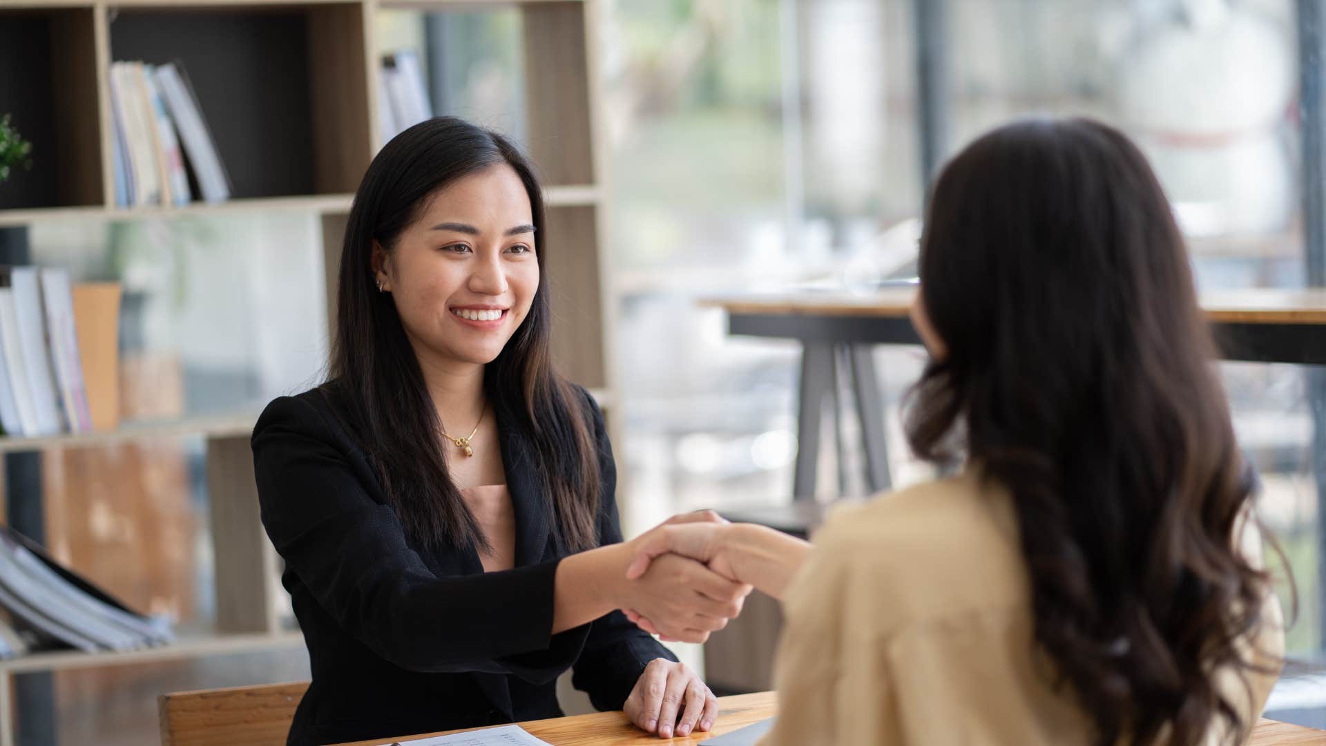 woman offering approval when other woman agrees with her