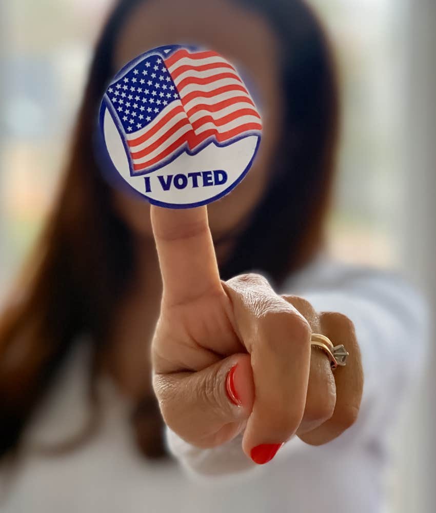 person places, I voted, sticker on window showing politically manufactured divisiveness