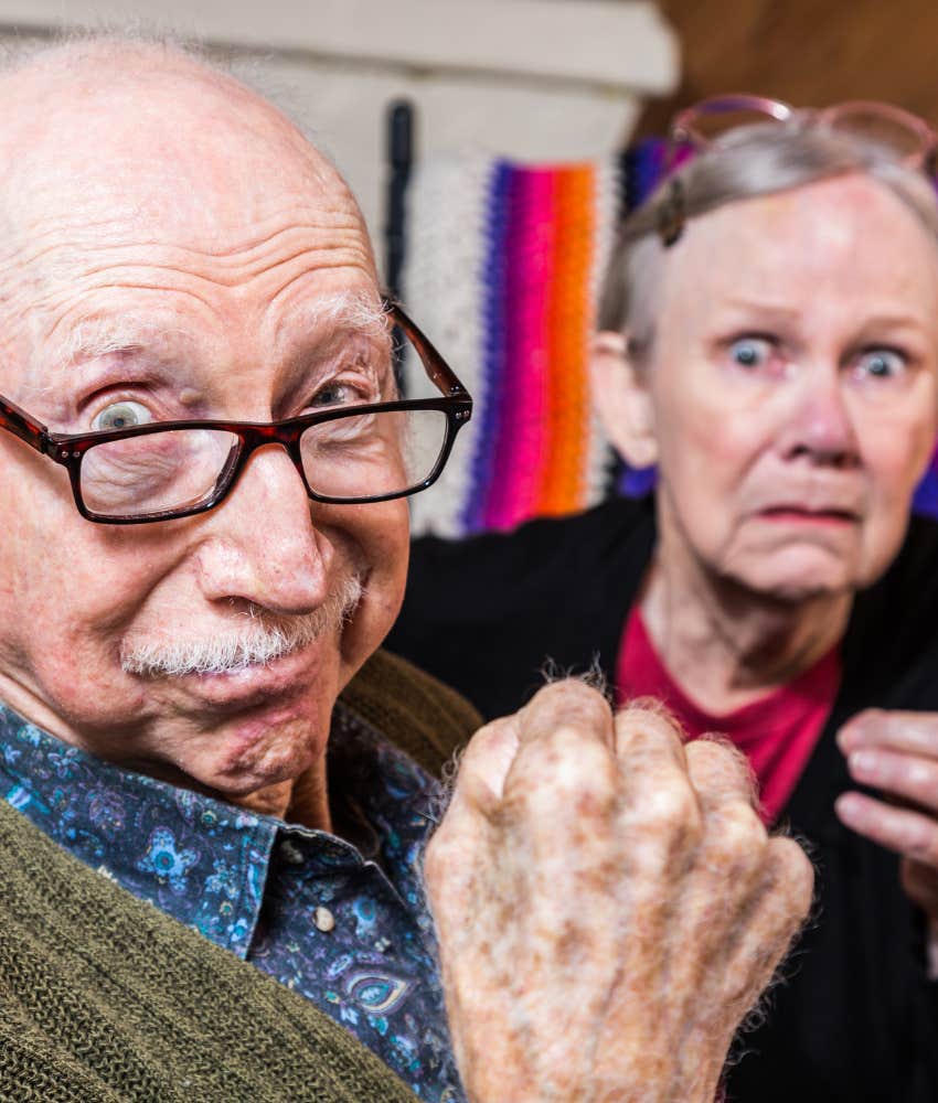 angry older couple make threatening gestures showing political division of families