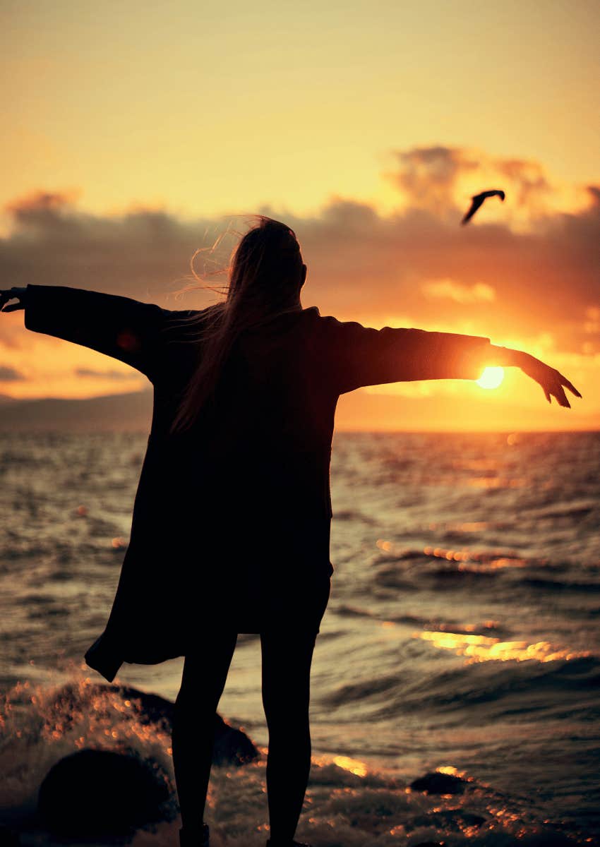 silhouette of women at the beach on sunset
