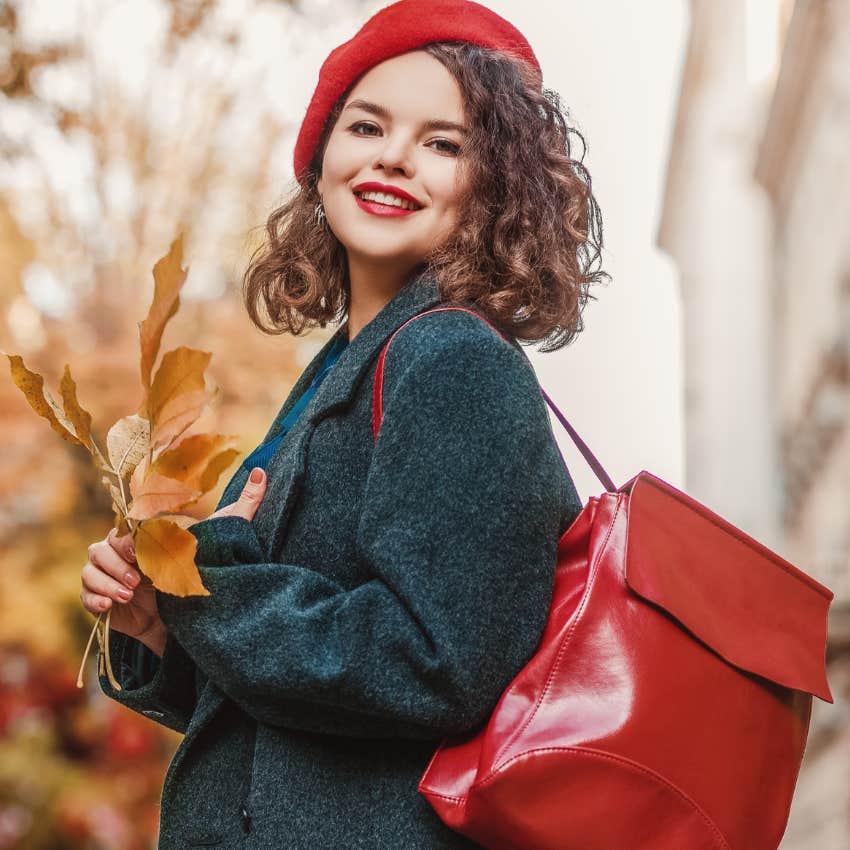 Woman wearing red clothing that makes her look attractive and hard to ignore