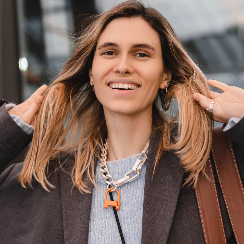 Woman wearing jewelry that makes her attractive and hard to ignore
