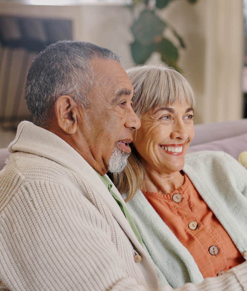 happy older couple showing let go of regrets