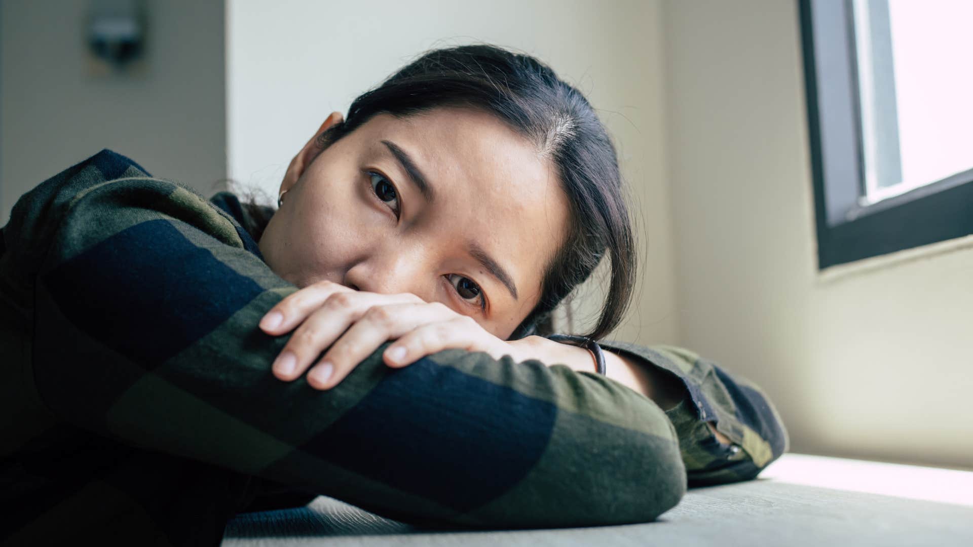 woman afraid of being rejected shutting down emotionally after getting yelled at