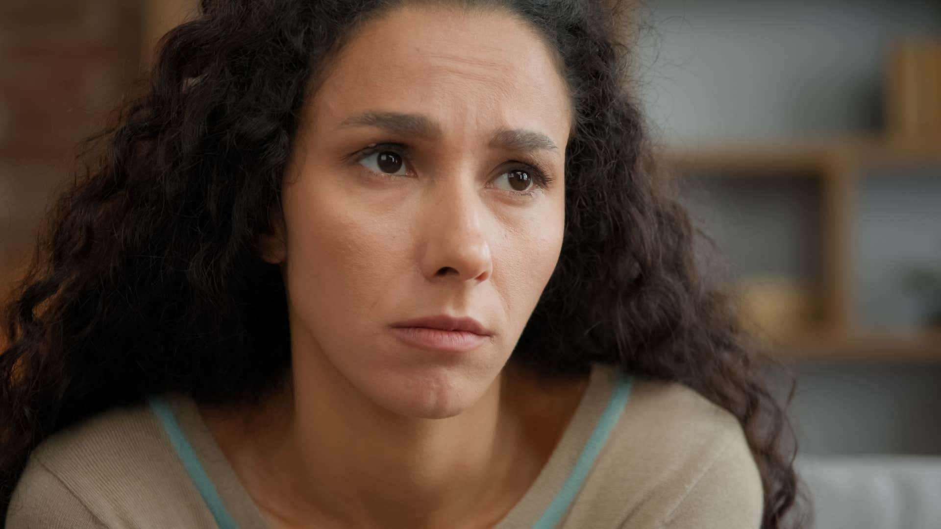 woman with a lot of pent-up shame shutting down emotionally